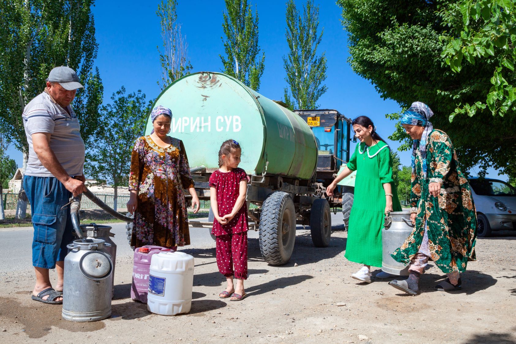 People get fresh water from a water tank
